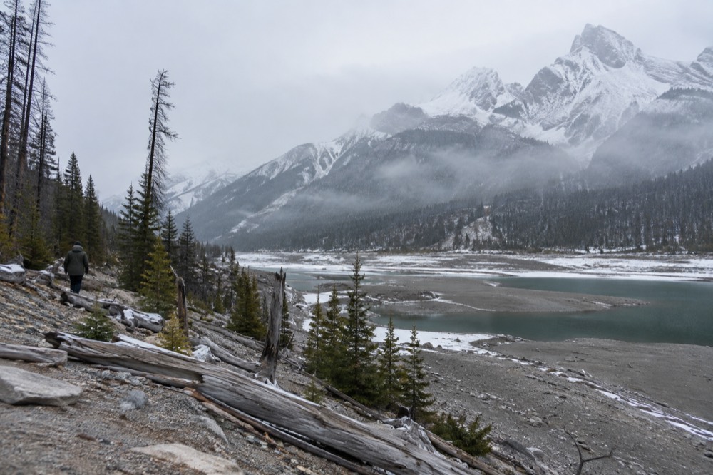 A deep limestone gorge with a river running through Maligne Canyon